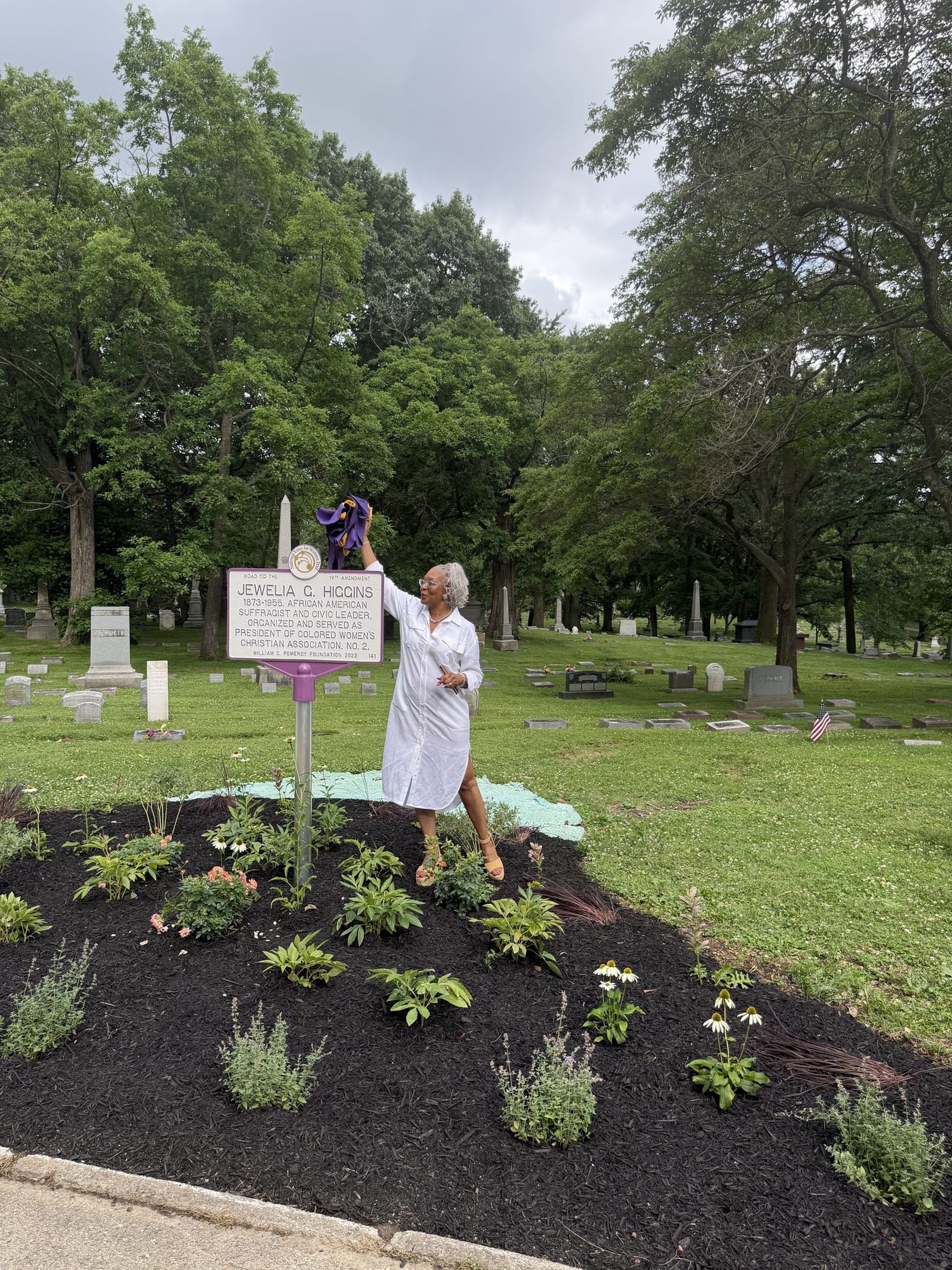 Community members gathered at a Charity's Children Project dedication ceremony